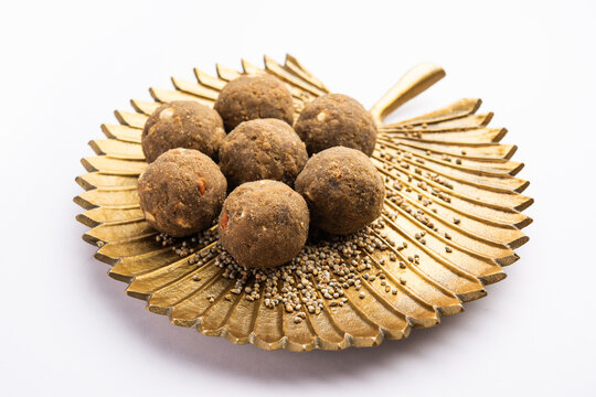 Bajra Atta Ladoo or kuler laddoo - Millet Flour Laddu, a popular winter sweet snack food from India