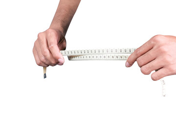 Man's hand holding a measuring tape on a white backgroundound