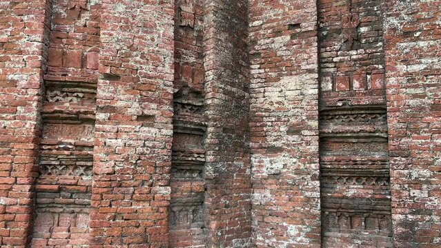 Niches on a brick wall in the ancient ruins of the Adina Masjid mosque in the village of Pandua.