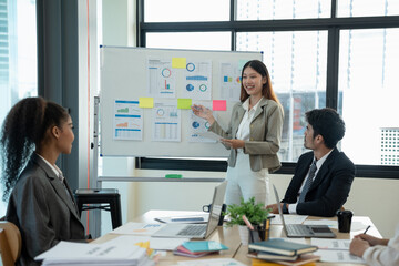 Startup Diversity Teamwork Brainstorming Meeting Concept. Business Team Coworkers Analyze Finance Report Laptop. People Working Start Up Process