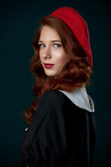 girl with red hair studio beauty portrait