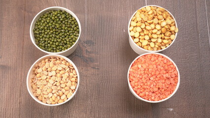 Assorted different types of beans and cereals grains. Set of indispensable sources of protein for a healthy lifestyle. Everyday use at Indian households.