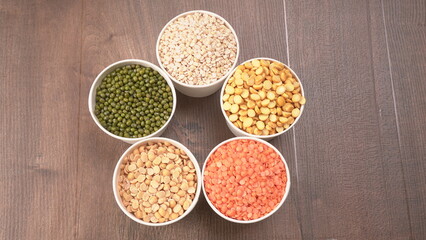 Assorted different types of beans and cereals grains. Set of indispensable sources of protein for a healthy lifestyle. Everyday use at Indian households.