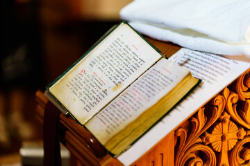 a prayer book in the church during the church worship.