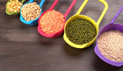 Assorted different types of beans and cereals grains. Set of indispensable sources of protein for a healthy lifestyle. Everyday use at Indian households.