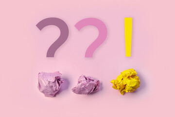 search for the right idea. the creative process. with a crumpled paper ball. think outside the box. finding an unusual solution. exclamation mark symbol