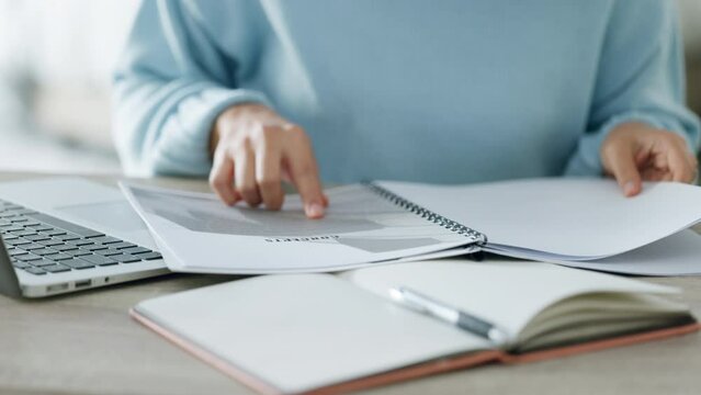 Portfolio, document and planning business woman reading or analysis of company crm marketing report, finance proposal information. Corporate hands with laptop, logistics and notebook for productivity