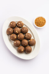 Fenugreek or methi ke Laddu, laddo or laddoo or sweet mithai balls for boosting immunity in winters