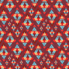 Ethnic seamless pattern of watercolor rhombuses on a burgundy background