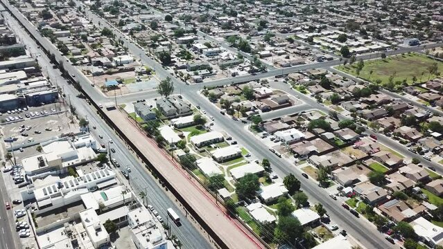 View of a drone flying to the left showing the USA-Mexico border