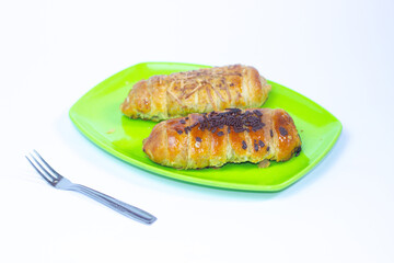 Bolen Pisang or Bolen Bandung is Banana Wrapped with Puff Pastry. It is usually as souvenirs from Bandung, West Java. Selective focus.