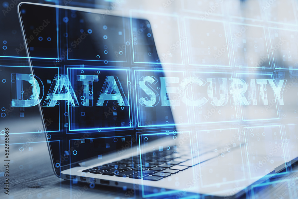 Poster close up of laptop with creative blue cubes data security text hologram on blurry background. techno