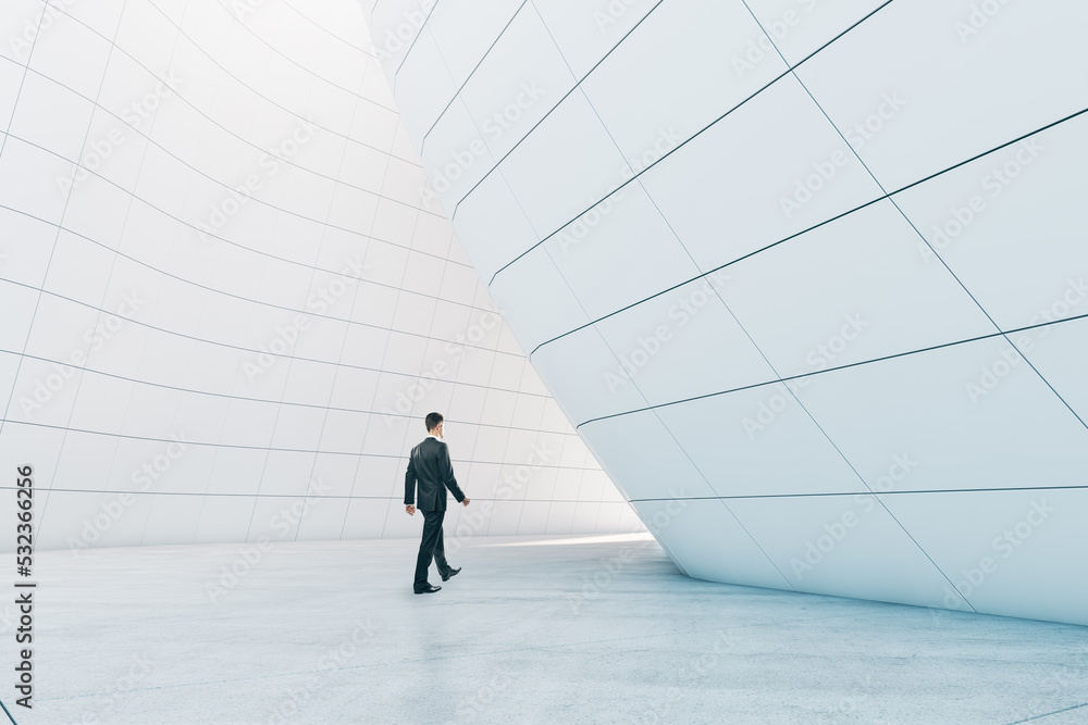 Poster Man walking in abstract glass building open space interior.