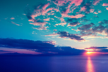 Naklejka na ściany i meble Seascape in the evening, sunset over sea
