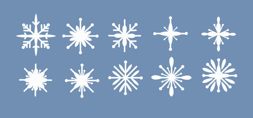 A set of white snowflakes of a simle shape