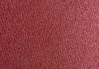 Fototapeta premium matte grungy sandpaper background closeup