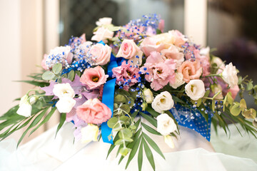 BUNCH OF COLORED ROSES for decoration with green leaves