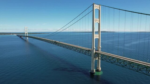 The Mackinac Bridge stretches five miles across the Straits of Mackinac to connect Mackinaw City and St. Ignace, Michigan.  And provides a link between the lower and upper peninsulas of Michigan.