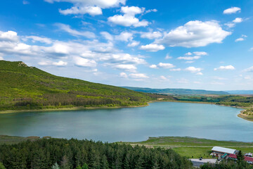 Aerial view from drone of a lake among hills