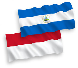 Flags of Indonesia and Nicaragua on a white background