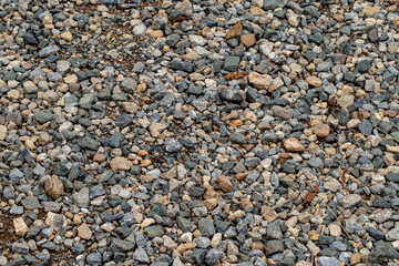 Various size and color rock on floor