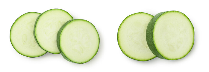 Fresh sliced zucchini isolated on white background with full depth of field. Top view. Flat lay