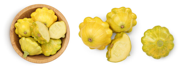 yellow pattypan squash in wooden bowl isolated on white background. Top view