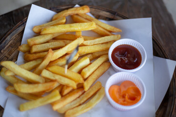 tasty and delicious french fries with source