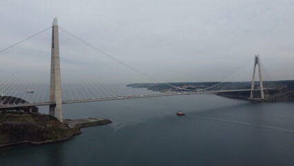 Fototapeta na wymiar Yavuz Sultan Selim Bridge as seen from foggy hill