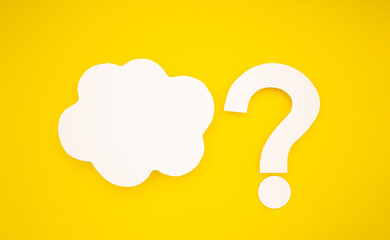 A white speech bubble cloud and question mark symbol are on a yellow background