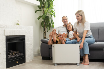Modern electric heater on floor at home
