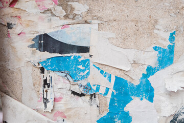 Ripped street poster background with torn paper texture