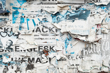 Torn street poster background with text, abstract paper collage