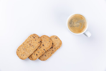 breakfast with espresso cup and chocolate chip cookies on white background