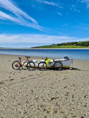 Fototapeta na wymiar Concept of enjoying the outdoors by bicycle and boat at Gweebarra Bay , County Donegal - Ireland