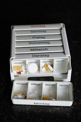 german pill organizer box for sorting daily and weekly medication doses