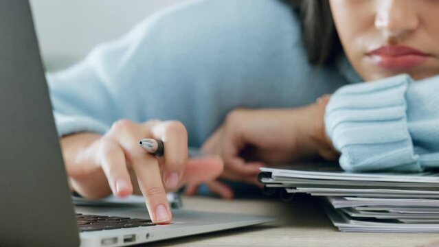 Tired student with laptop and books sad with writing quality, research problem or copywriting at a desk. Woman on pc internet surfing for inspiration, blog ideas while studying or working on article