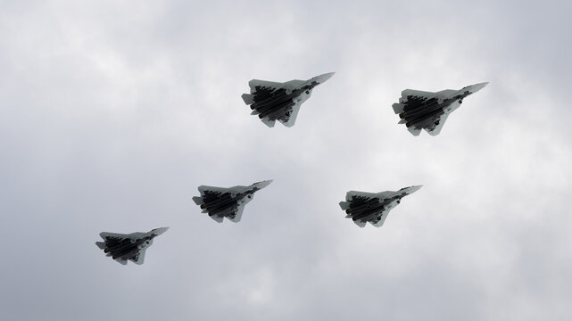 3d render a team of fighter jets in the clouds flying in a group war Russia China Ukraine Taiwan
