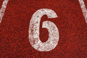 The number 6 at start point of running track or athlete track in stadium