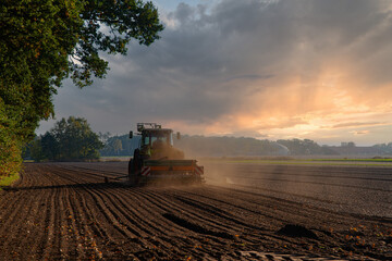 Agricultural work with tractors, autumn work in the field.