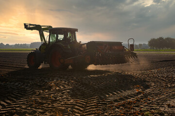 Agricultural work with tractors, autumn work in the field.