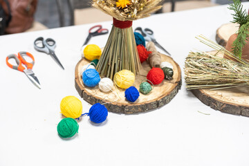 spikelets of wheat in a white retro jug on the kitchen table. Simple and beautiful decor for home and kitchen.