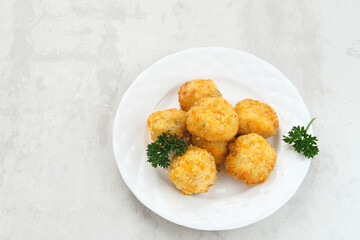 Delicious Bitterballen, typical Dutch snacks made from flour, cheese, milk coated with bread crumb filled with mozzarella.
