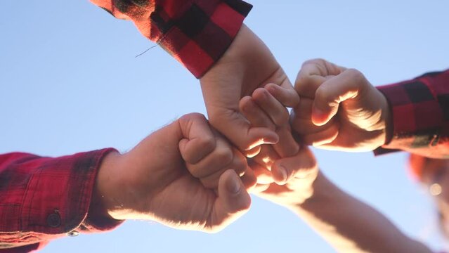 business group team. a community team of workers put their hands together. teamwork business support concept. collaboration workers hands together close-up. teamwork group happy family