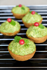 Homemade pastry. Avocado Red Currant Tart. Crispy crust with rich and creamy avocado fillings and...
