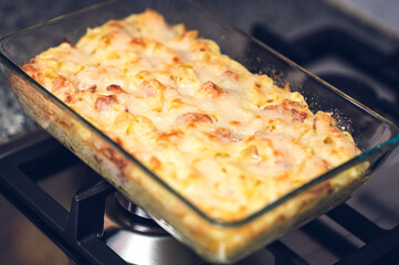 Home made appetizing spaghetti with bacon and cheese.