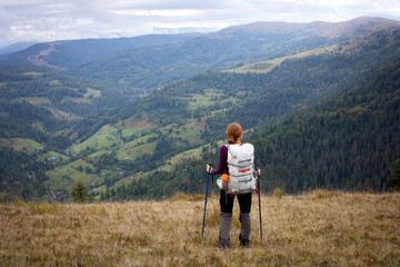 Fototapeta na wymiar tourist girl at the Carpathians