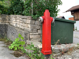 Red fire hydrant on the streets of the German city of Miesbach