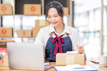 SME entrepreneur Small business entrepreneurs Online selling ideas,Happy Young Asian business owner...