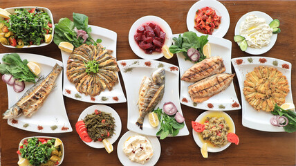 different kinds of cooked fish; grilled, poached, pan-broiled, bake 